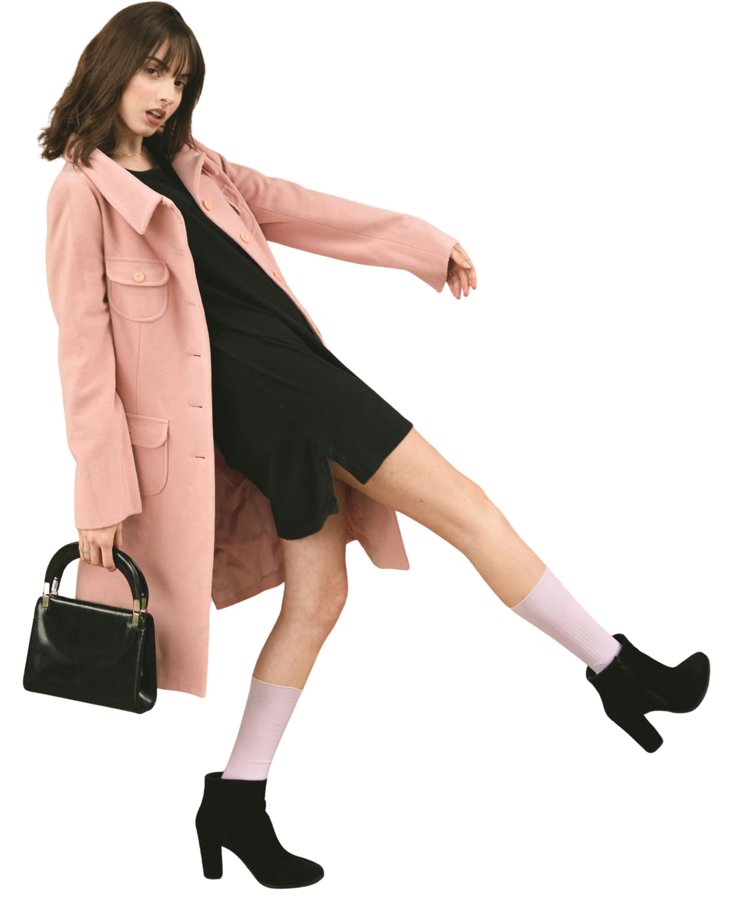 Model in a pink coat and black dress